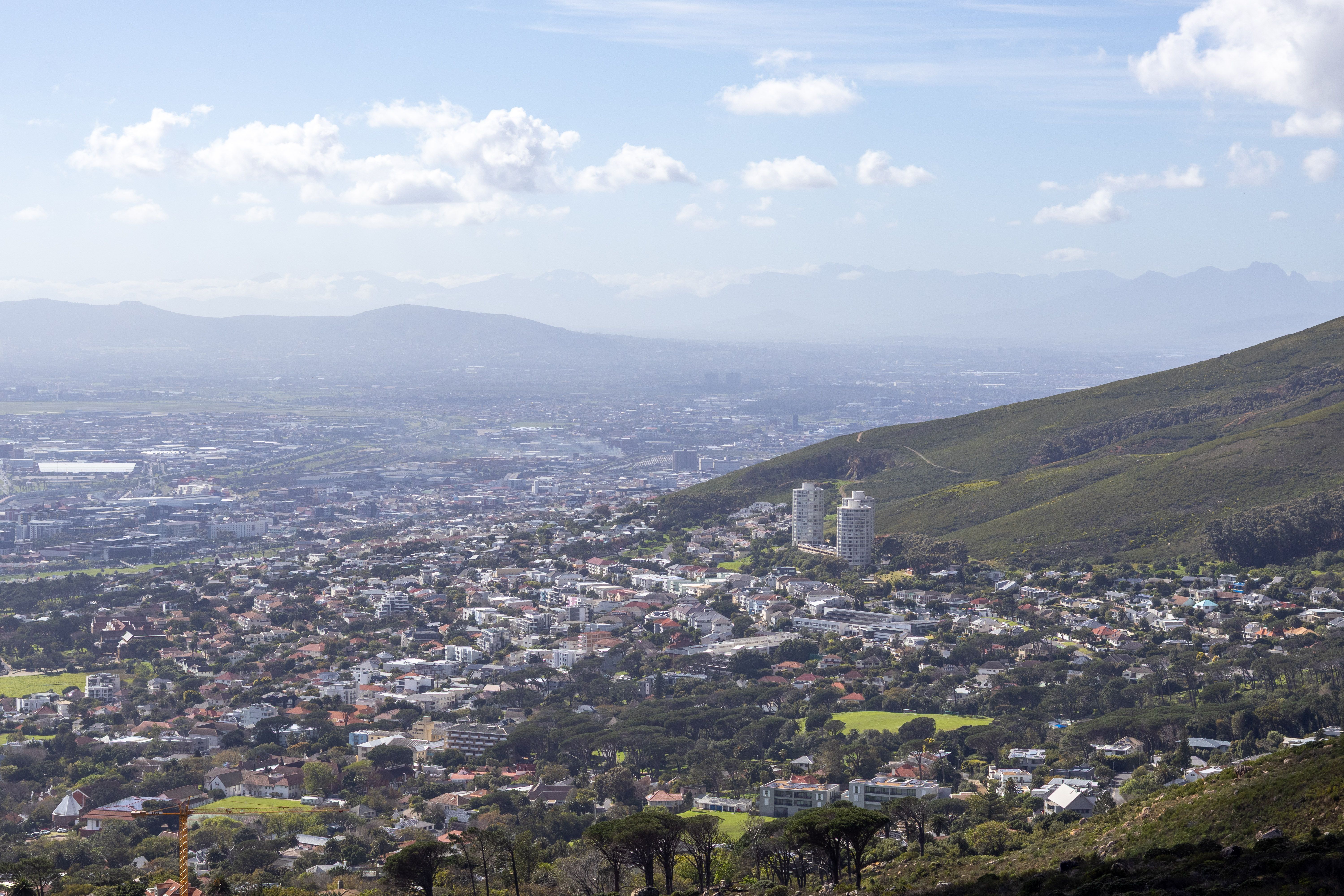 Aerial Cape Town cityscape with Table Mountain in the background.