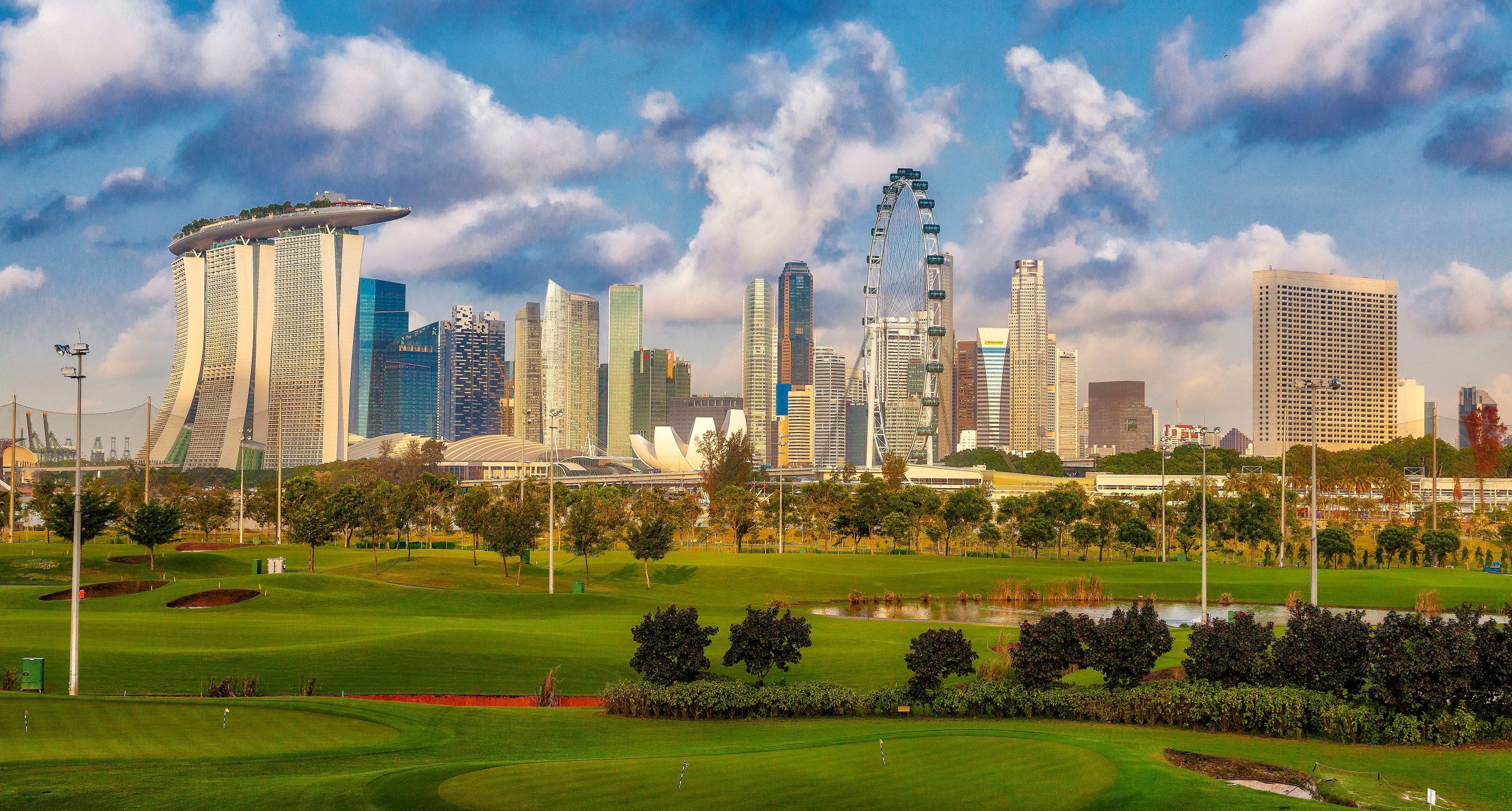 Singapore skyline with Marina Bay Sands and lush greenery, representing modern international city breaks